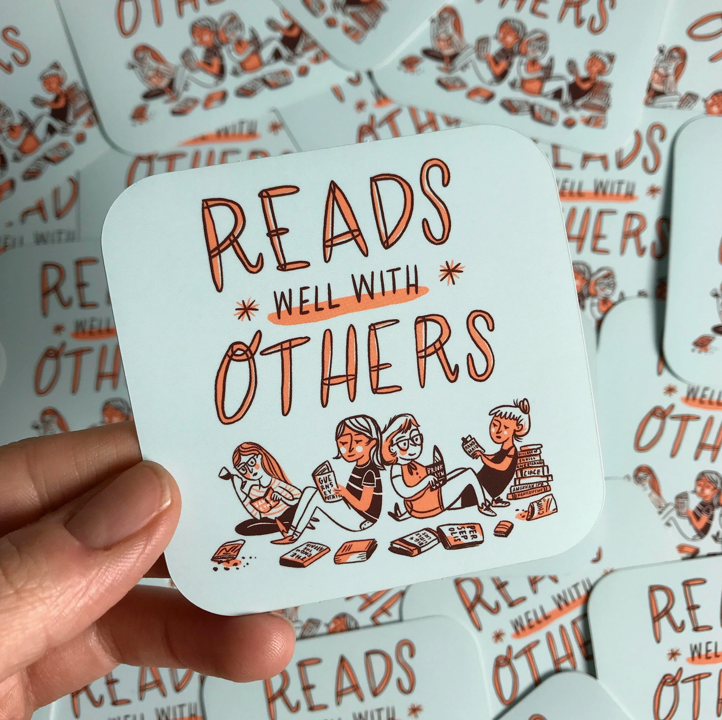 Reads Well with Others Sticker